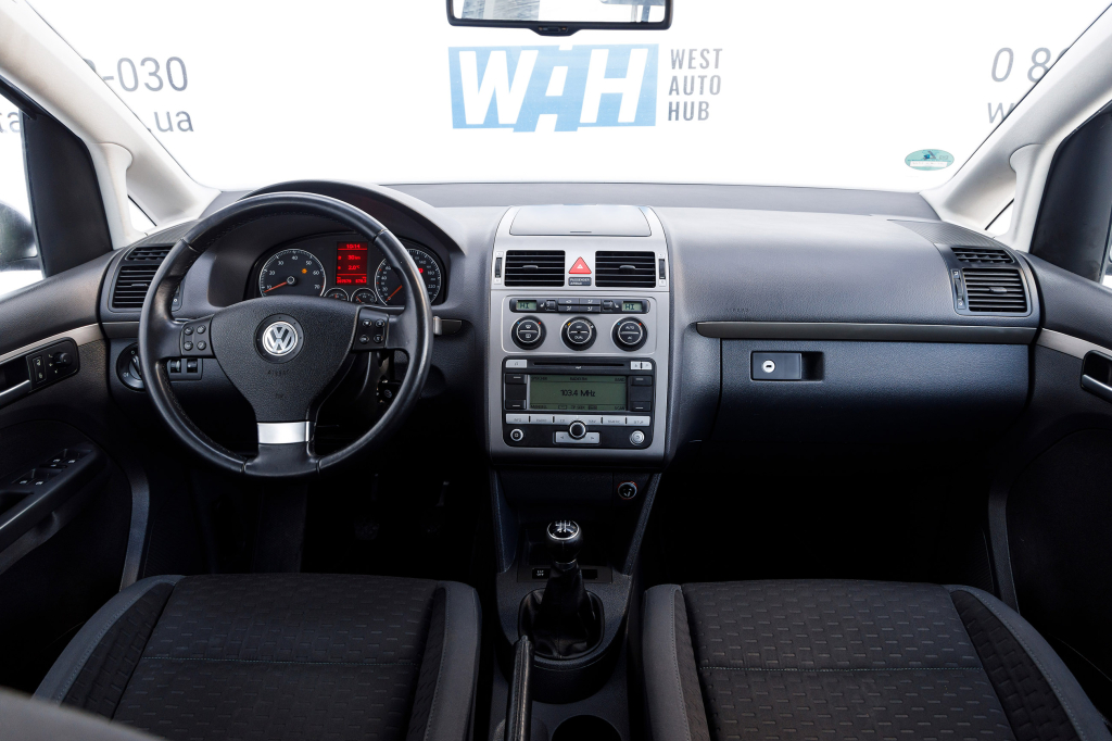 Volkswagen Touran фото 8