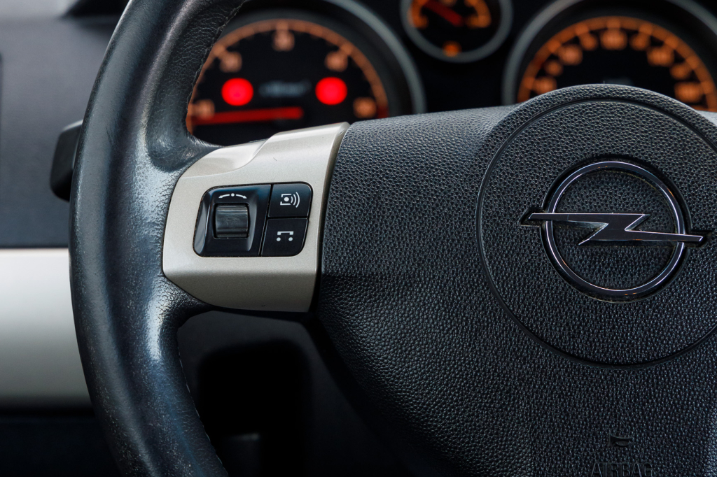 Opel Astra H фото 9