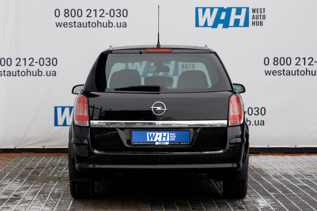 Opel Astra H фото 2