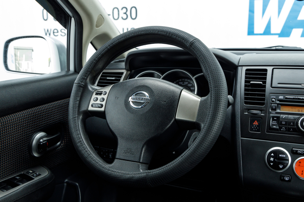 Nissan TIIDA 2010 фото 21