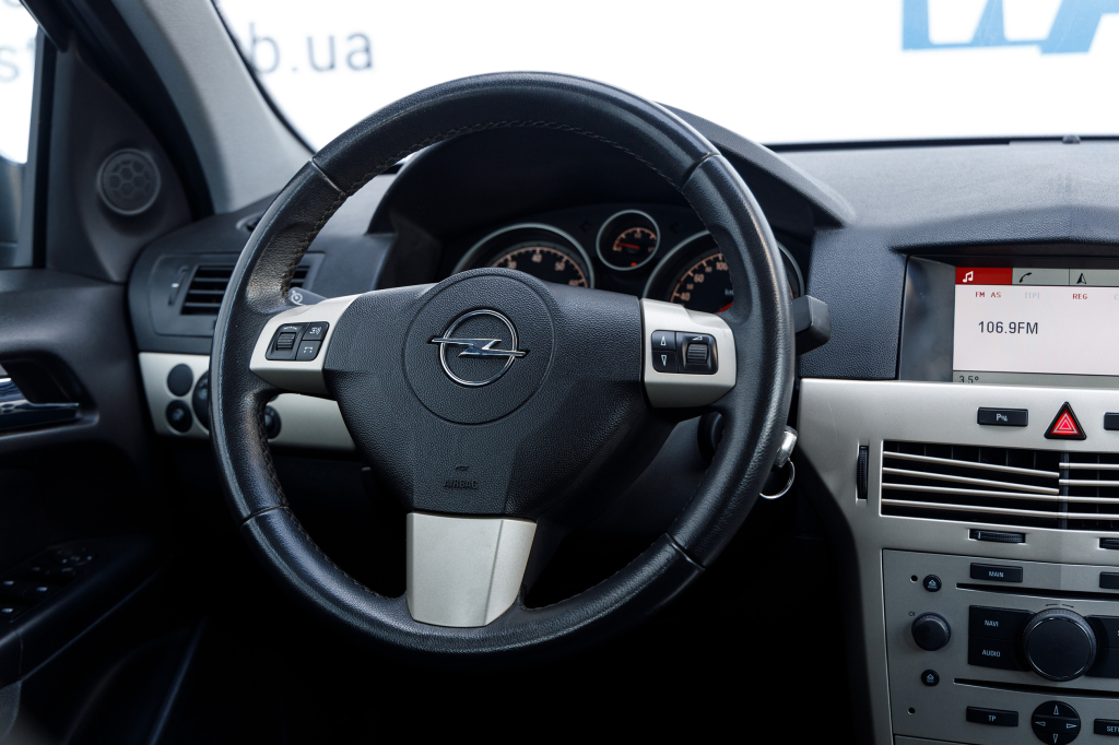 Opel Astra H фото 7
